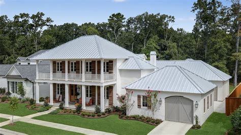 metal roof on white house|white house with galvalume roof.